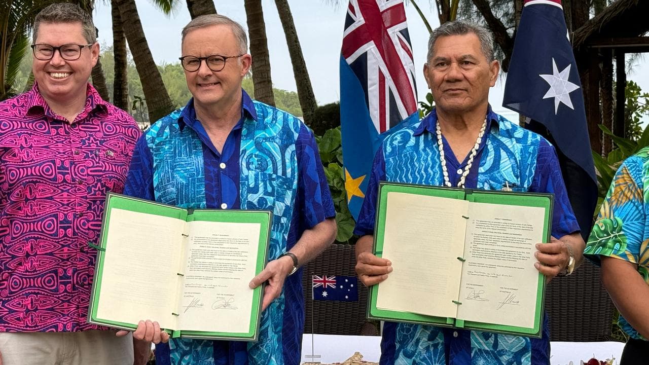 Anthony Albanese and Tuvalu Prime Minister at the signing last year.