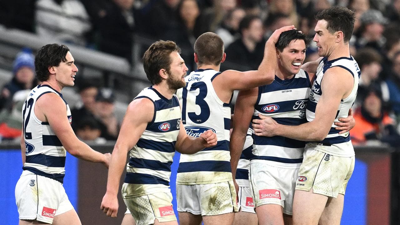 Celebrating Geelong players.