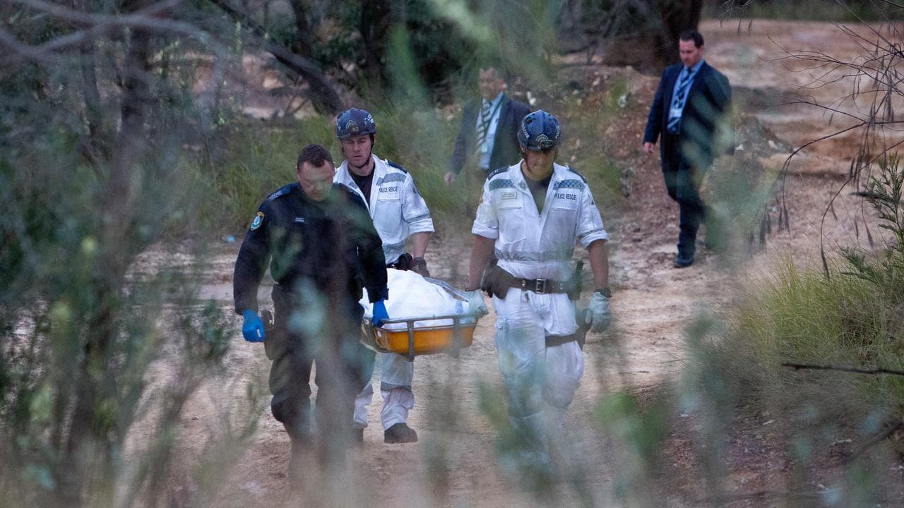 Police removing Namja Carroll's body (file image)