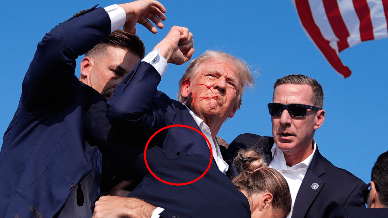 Image of Trump supposedly showing a bullet hole in his jacket