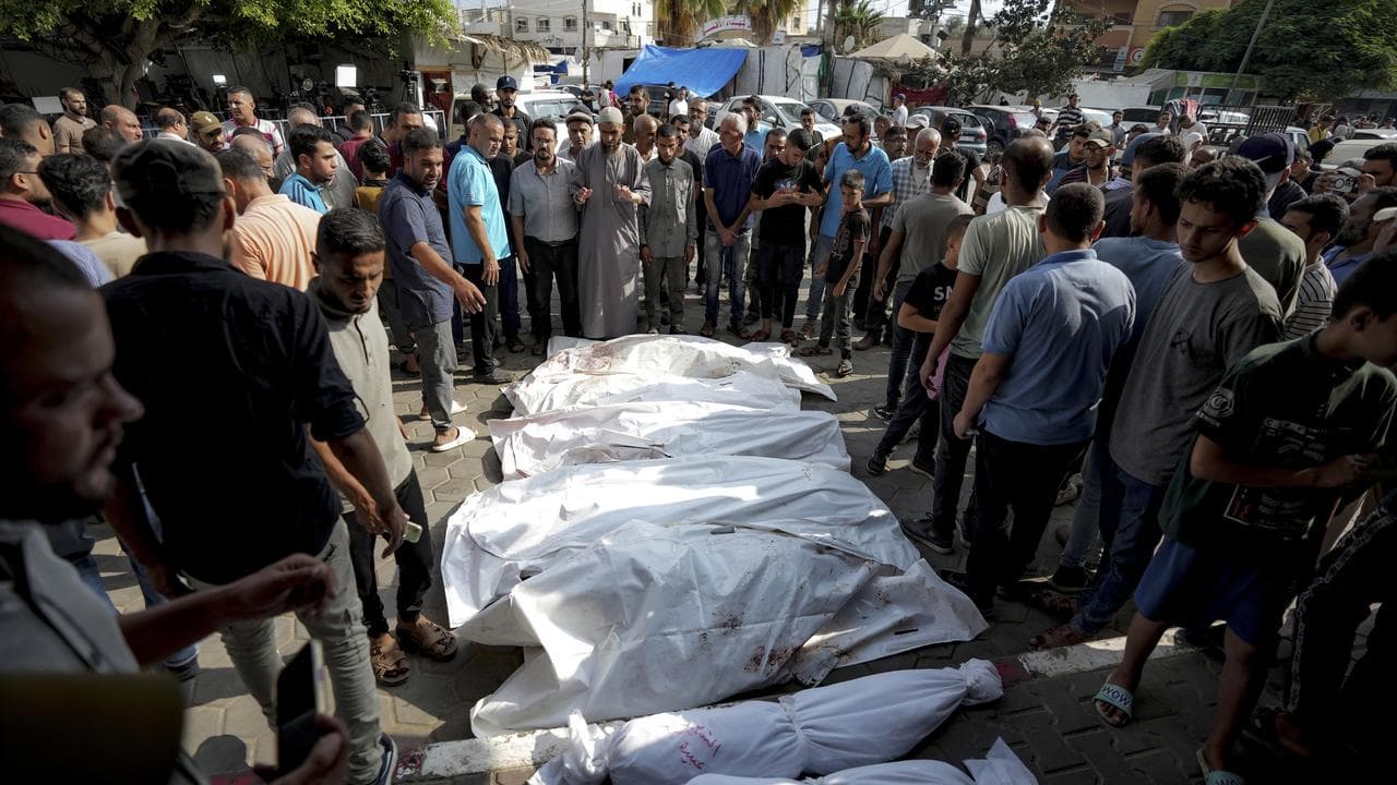 Bodies at a hospital morgue in Deir al-Balah, Gaza Strip