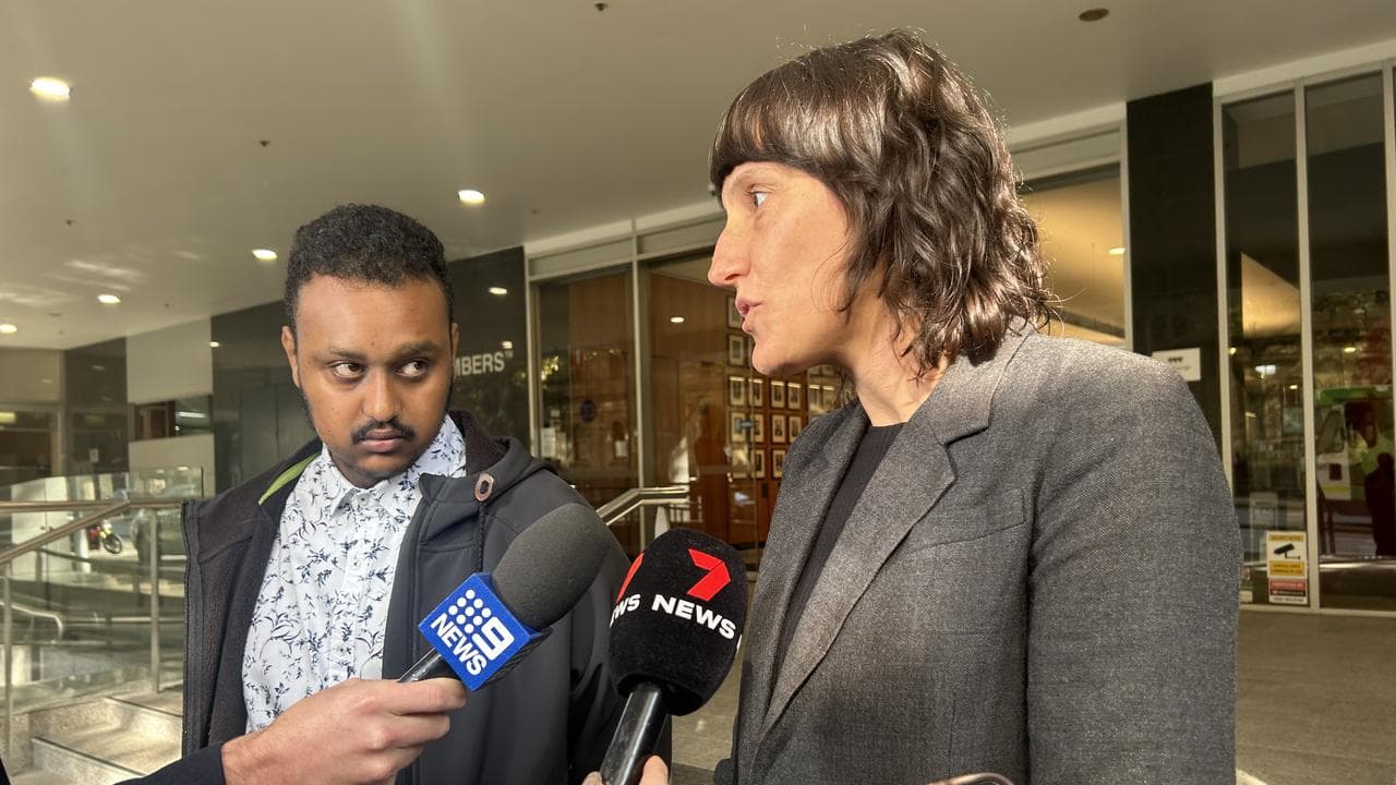 Public housing tower resident Barry Berih and lawyer Louisa Bassini.