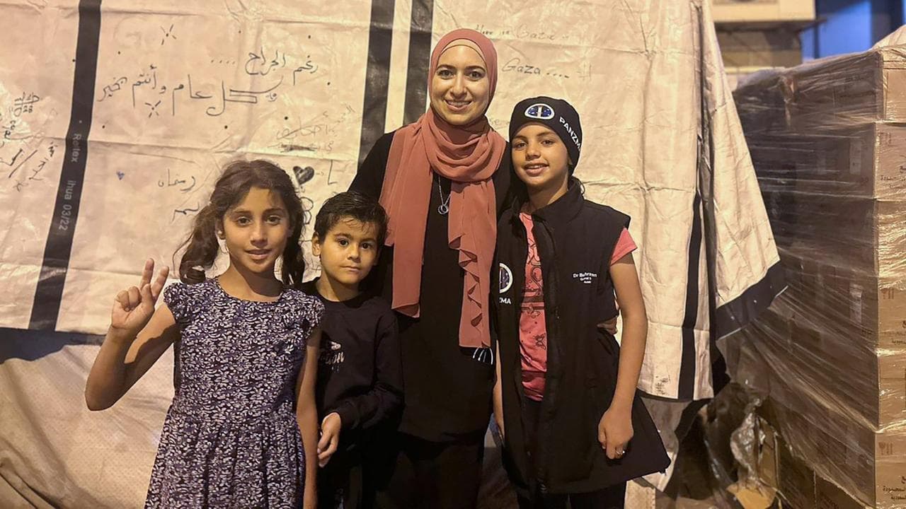 Bushra Othman with children in Gaza