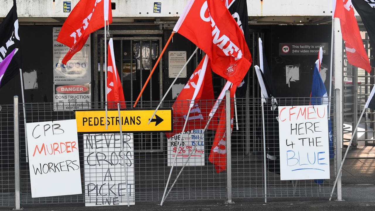 CFMEU protest signs.