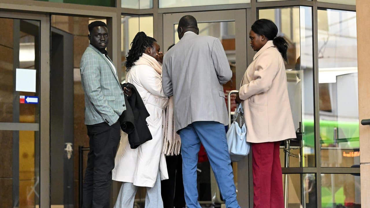 Supporters of Atem Akoi Thon depart the Melbourne Magistrates Court