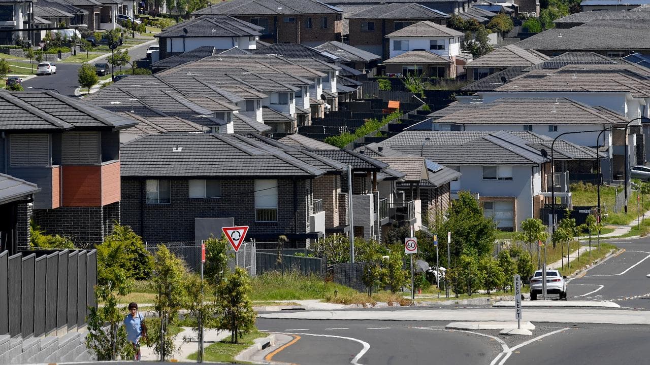 Houses packed into a street.