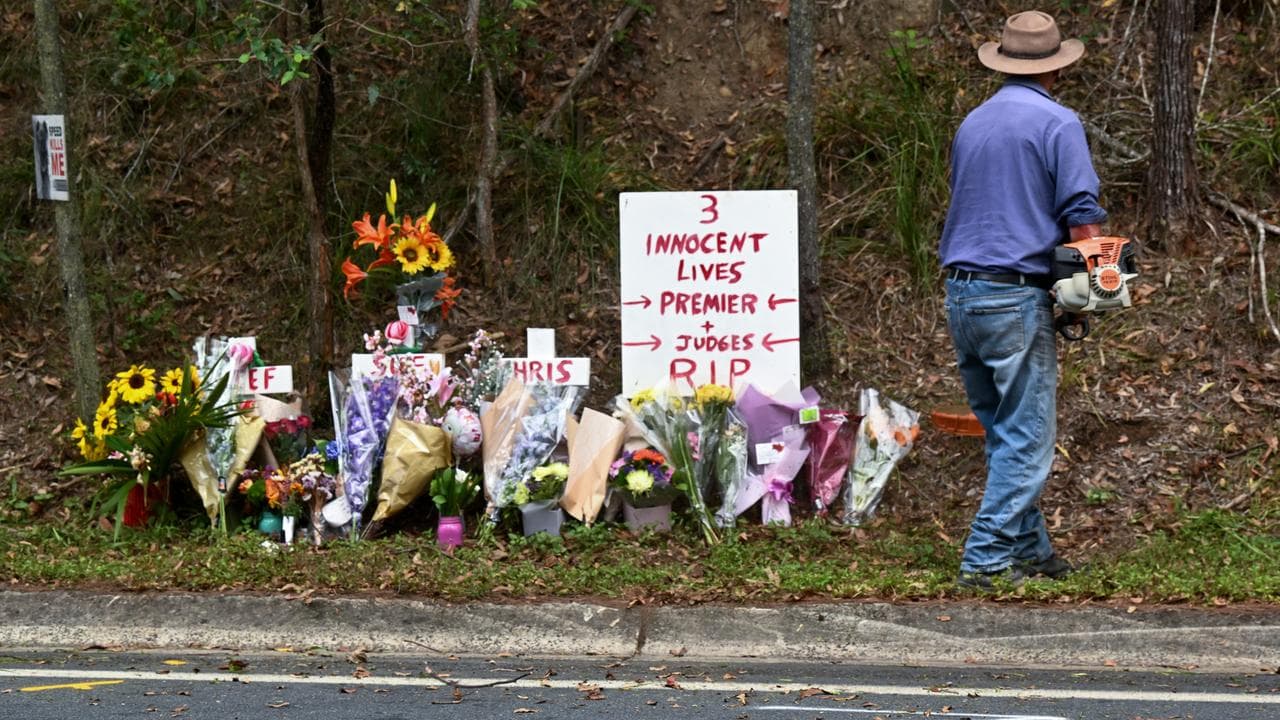 Flowers sit on the side of a road where there was a fatality.