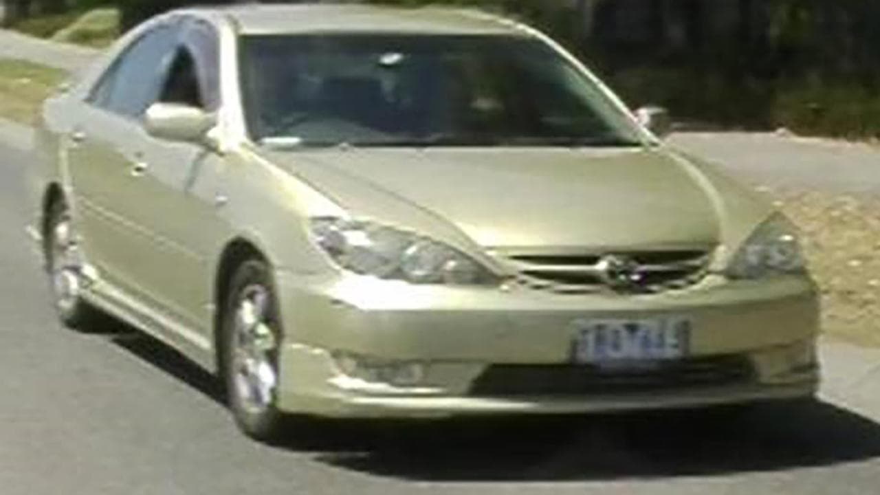 Adrian Romeo's gold Toyota Camry sedan