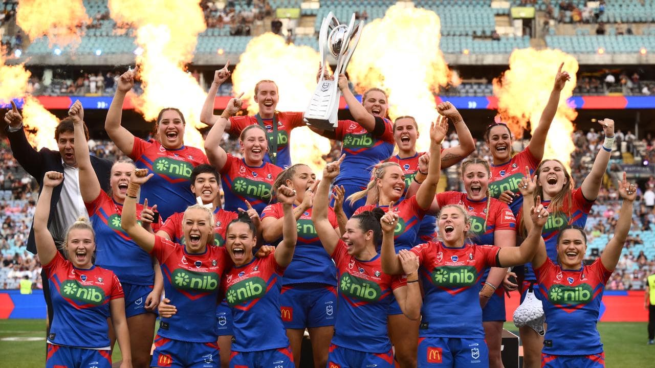 Celebrating Newcastle Knights players.