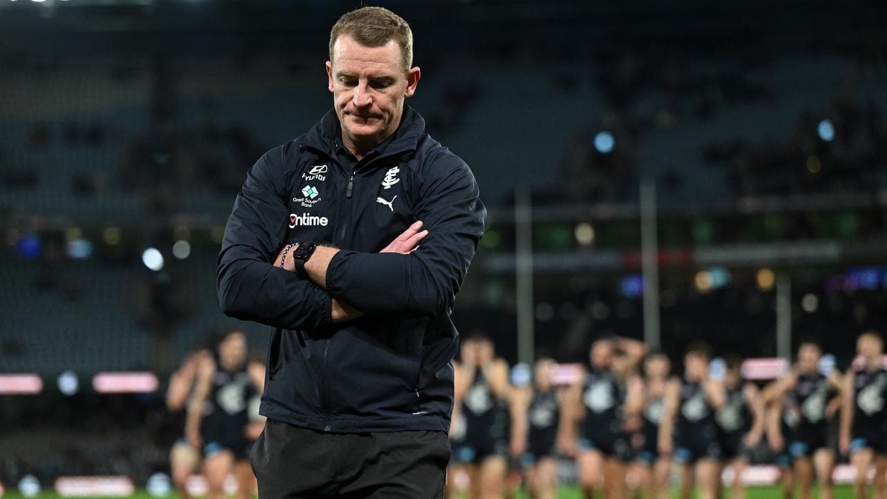 Michael Voss leaves Marvel stadium ahead of his beaten side.