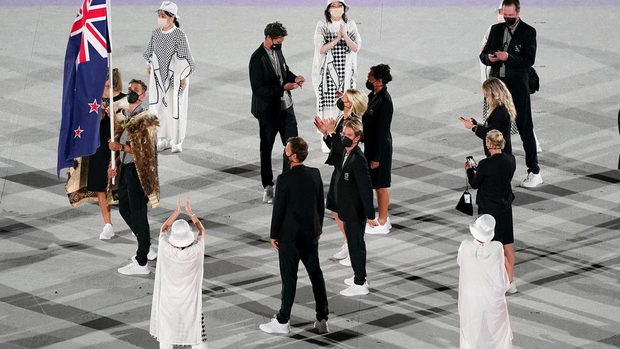 NZ athletes walk out at the opening ceremony of the Tokyo 2020 games.