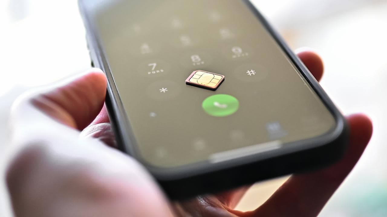 A SIM card on a phone (file image)