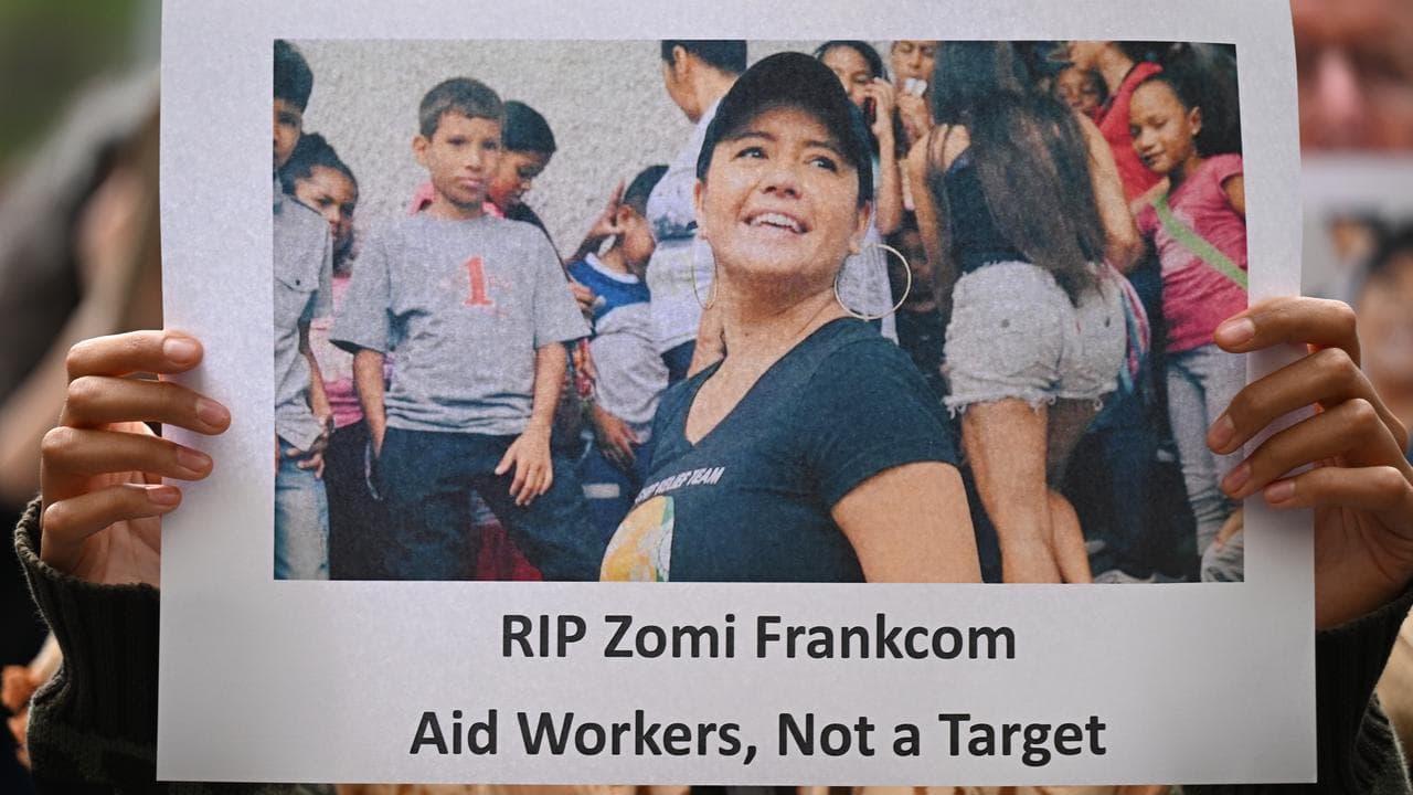 Rally over aid worker deaths