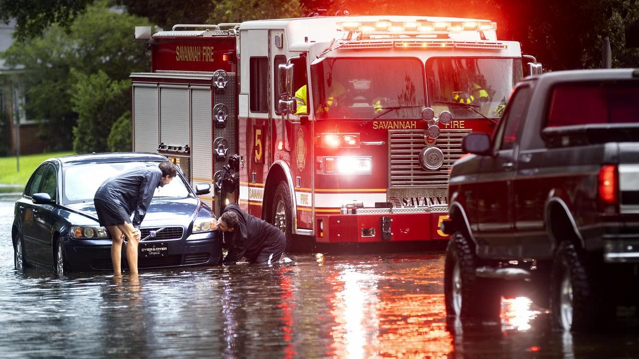 A stranded vehicle during Tropical Storm Debby in Savannah, Georgia