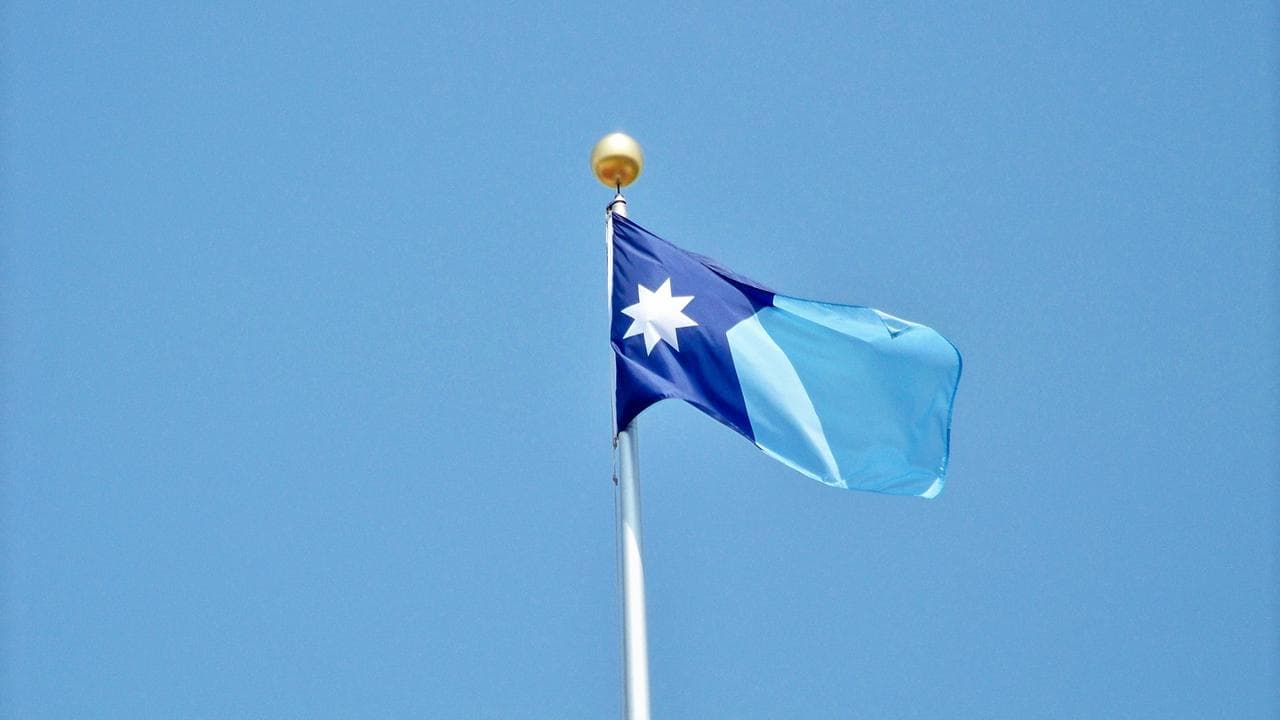 New Minnesota flag raised on Statehood Day 2024.