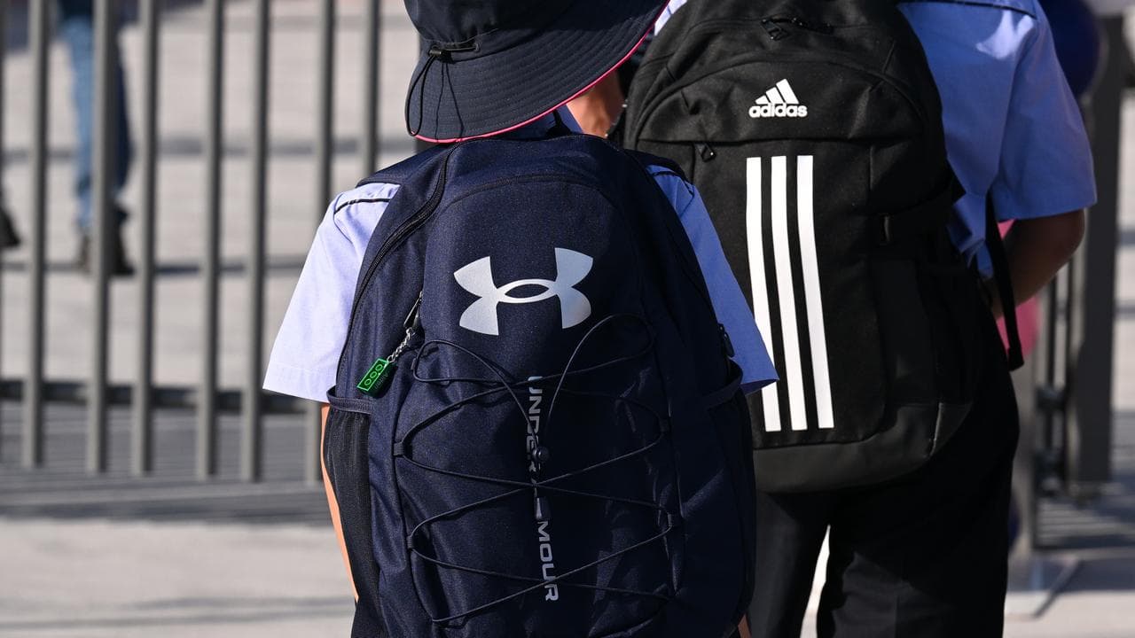 A child with a school backpack.