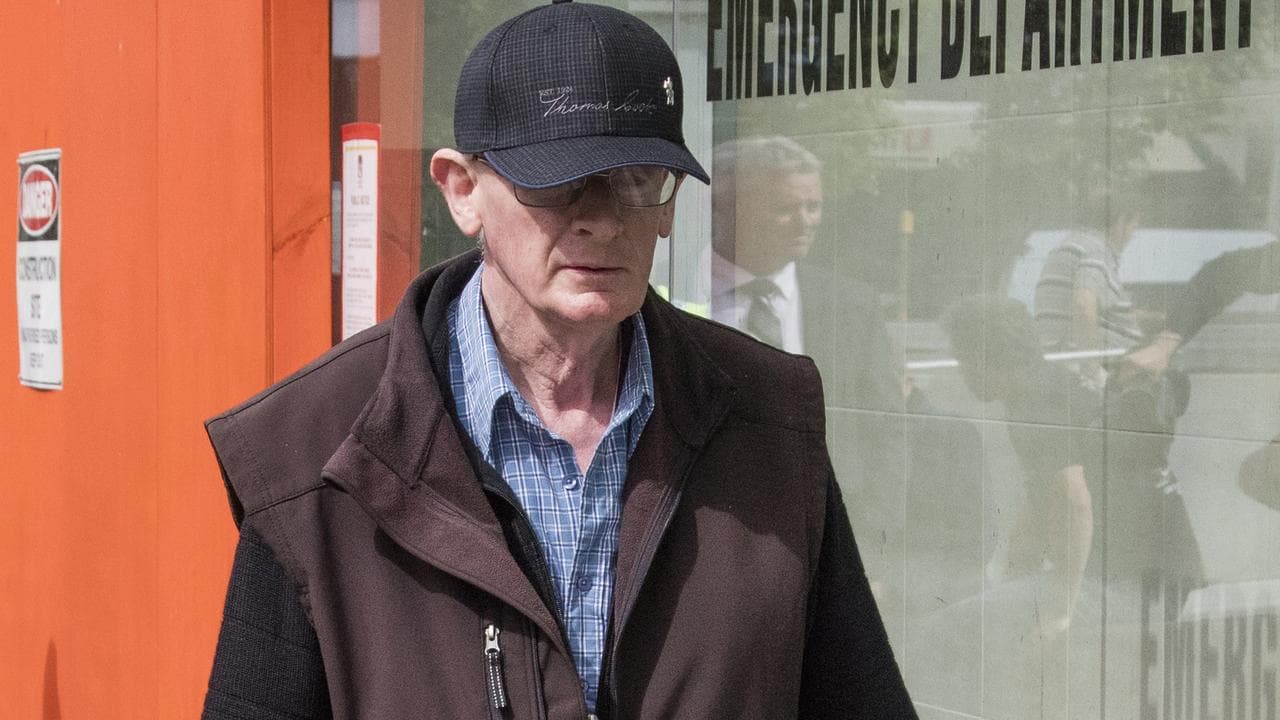 A man walking on a street.