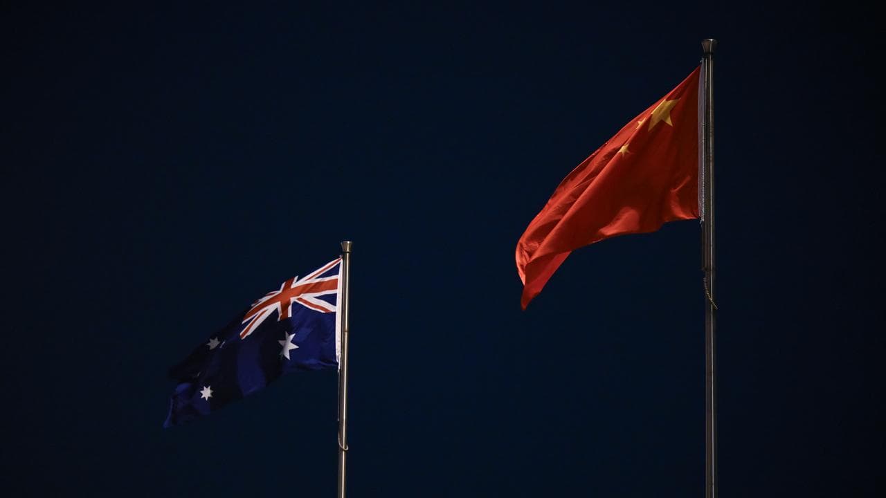 The national flags of Australia and China