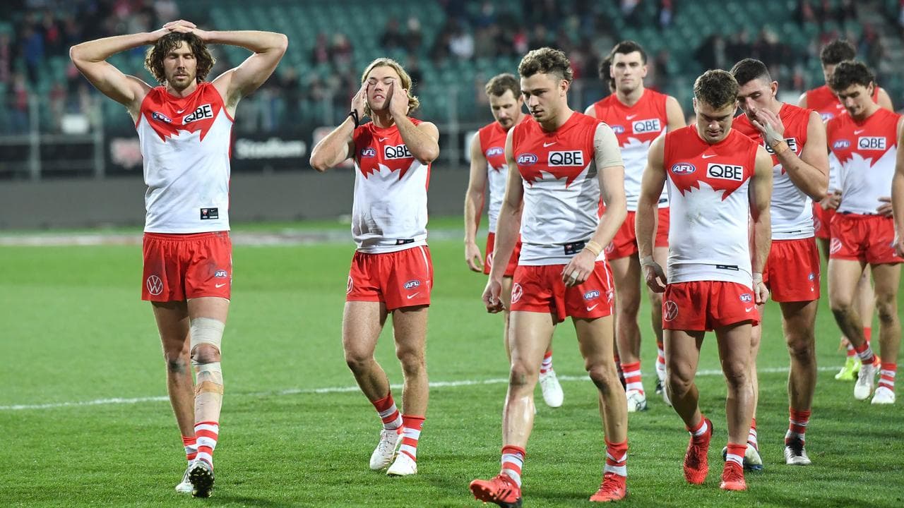 Disappionted Swans players.