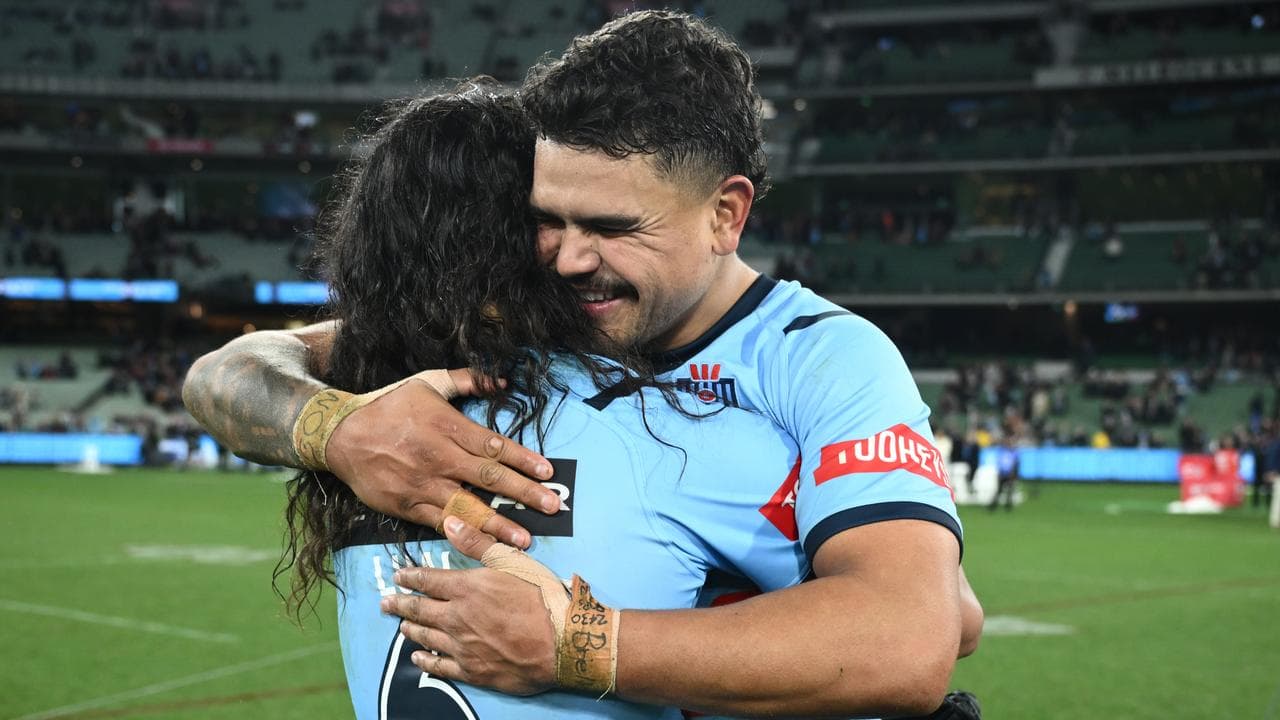 Latrell Mitchell of the Blues celebrates a State of Origin win.