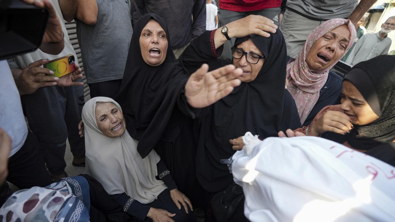 Palestinians mourn relatives killed in the Israeli bombardment of Gaza