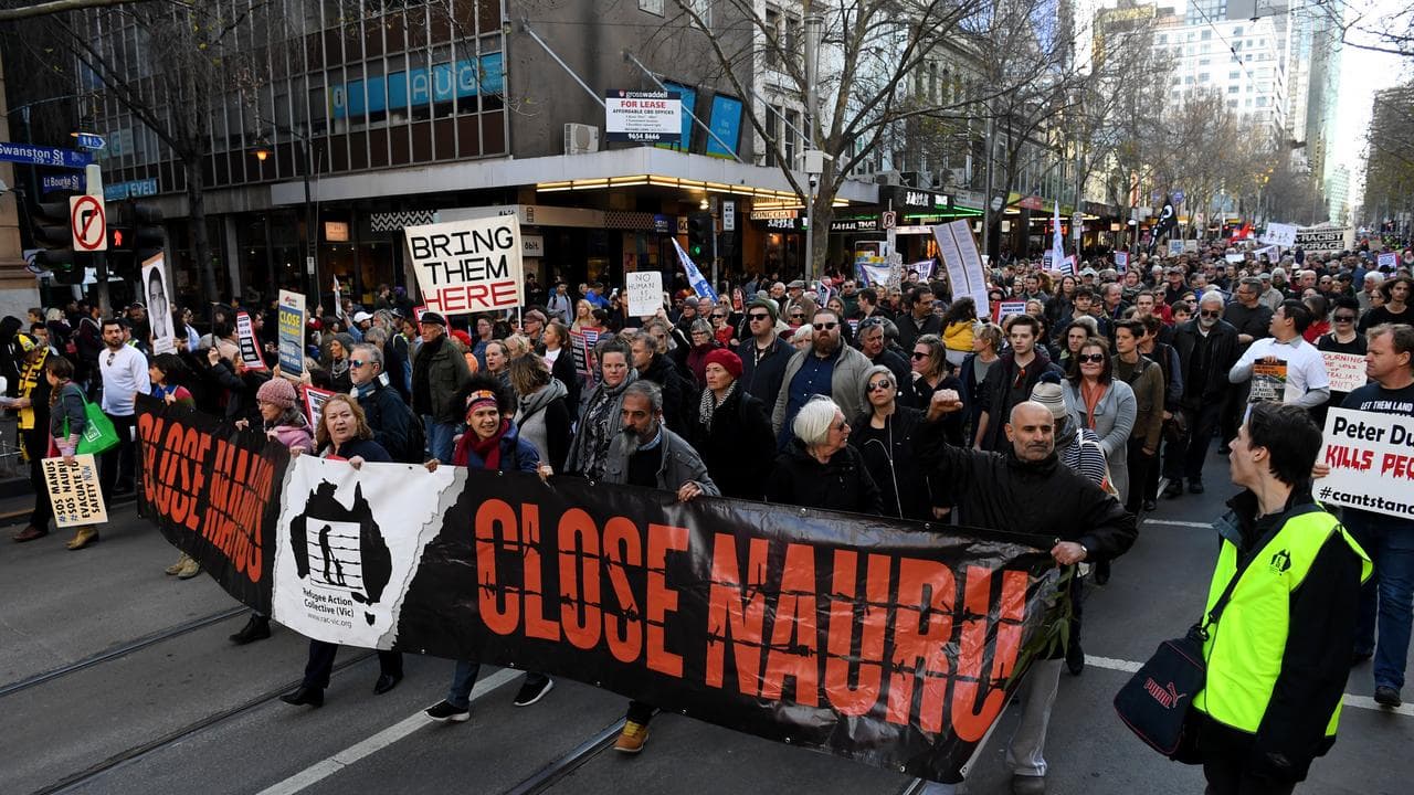 Protesters outside of the State Library of Victoria in Melbourne