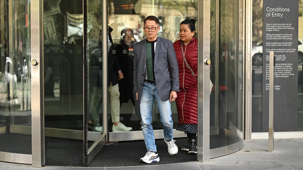 Supporters of Oudom Doeun depart from the County Court 