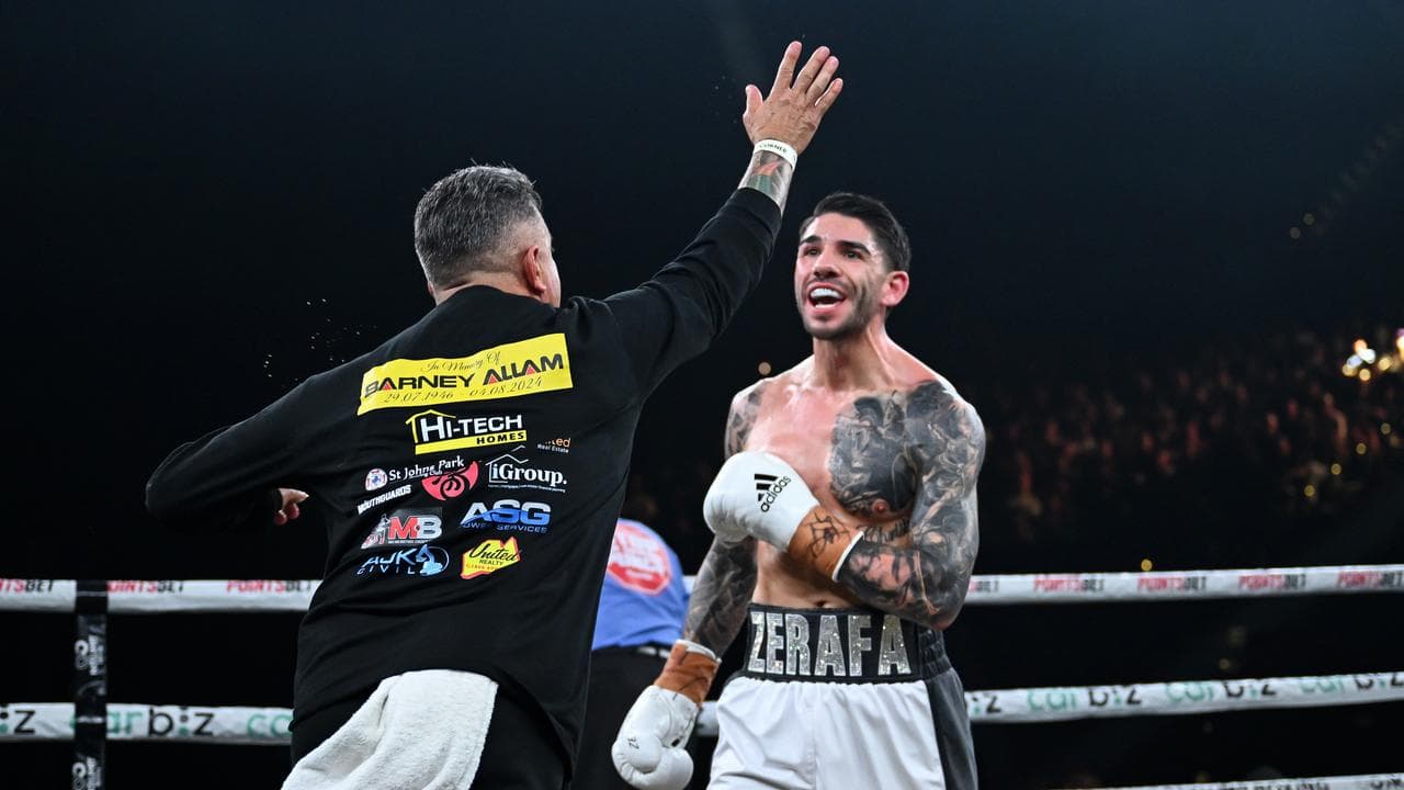 Trainer Tommy Mercuri reacts towards boxer Michael Zerafa (file image)