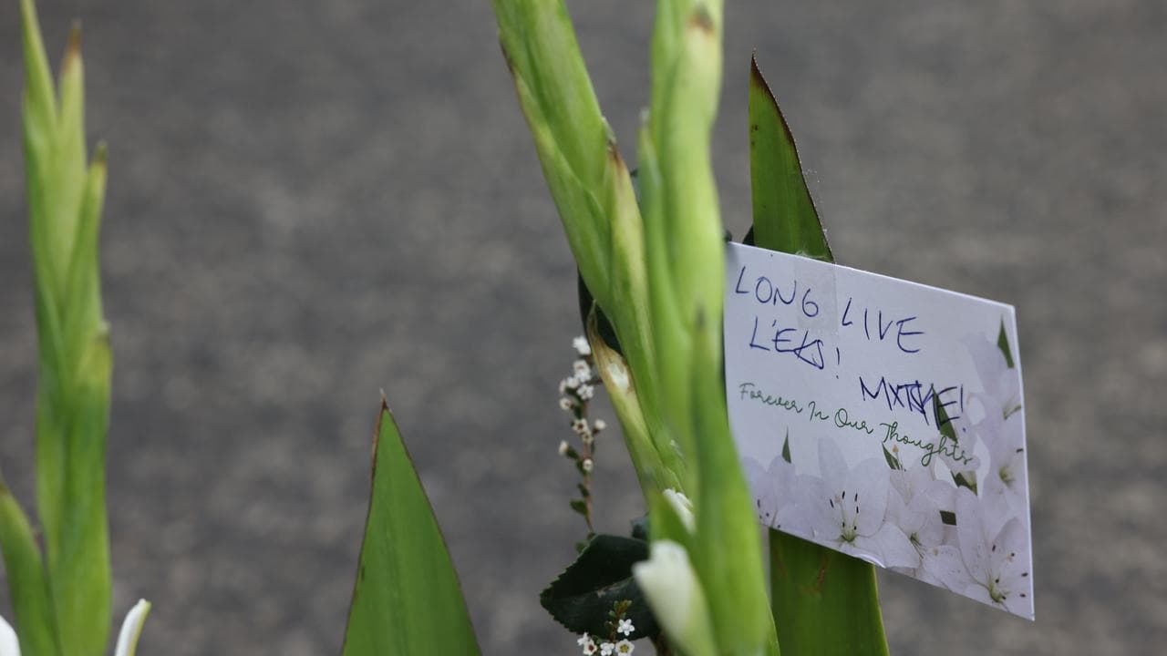 A floral tribute at the scene of the stabbing