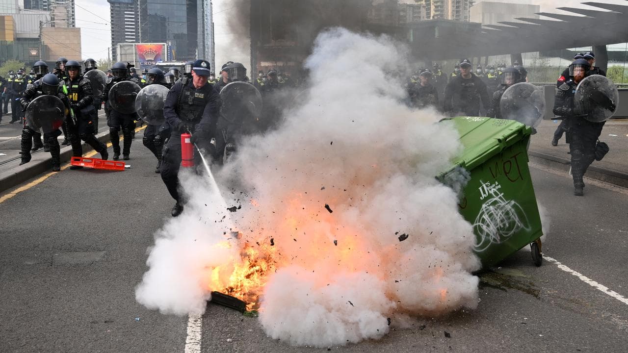 Victoria Police attempt to extinguish a fire