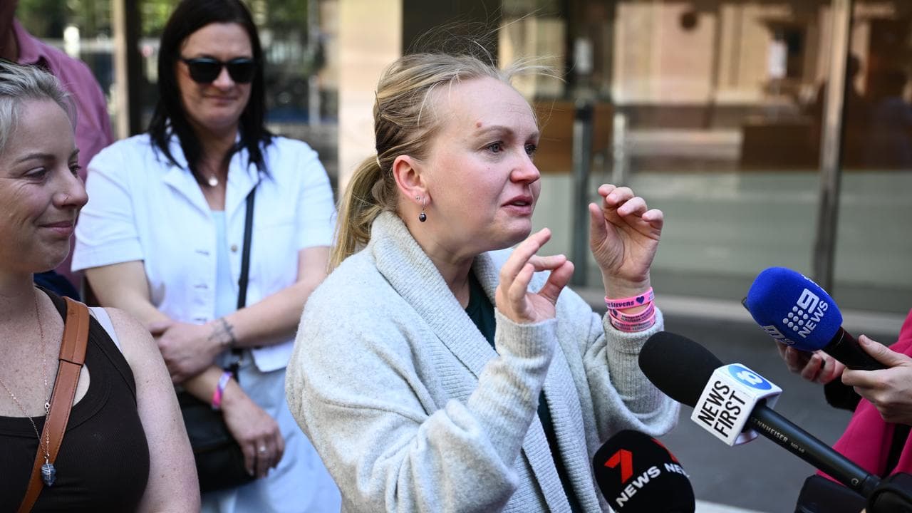 Yana Stevens (right), mother of Olivia Stevens, speaks to media