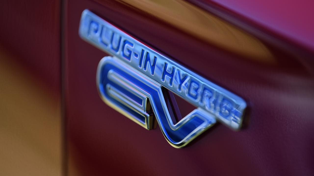 A plug-in hybrid symbol on an electric car (file image)