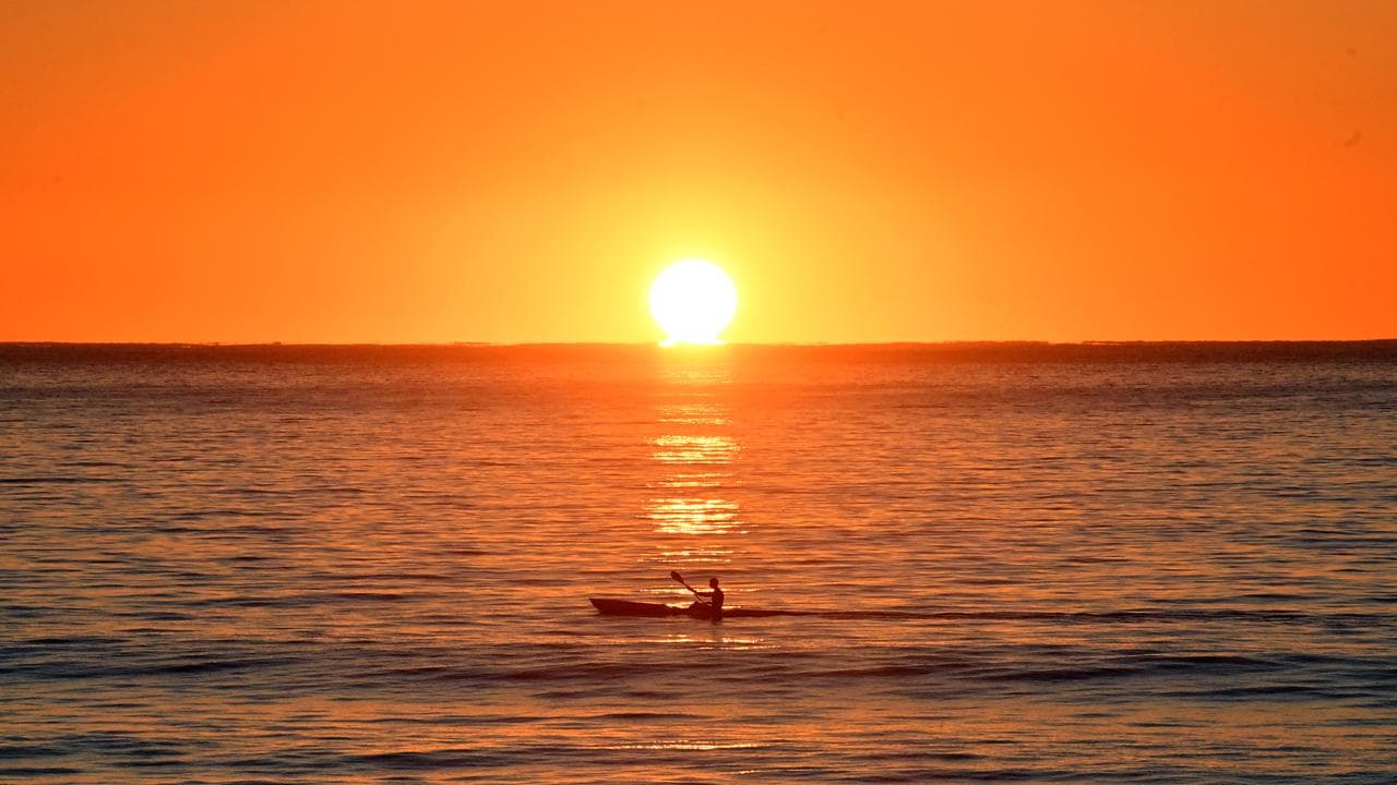 A kayaker paddles at sunrise in Sydney (file image)