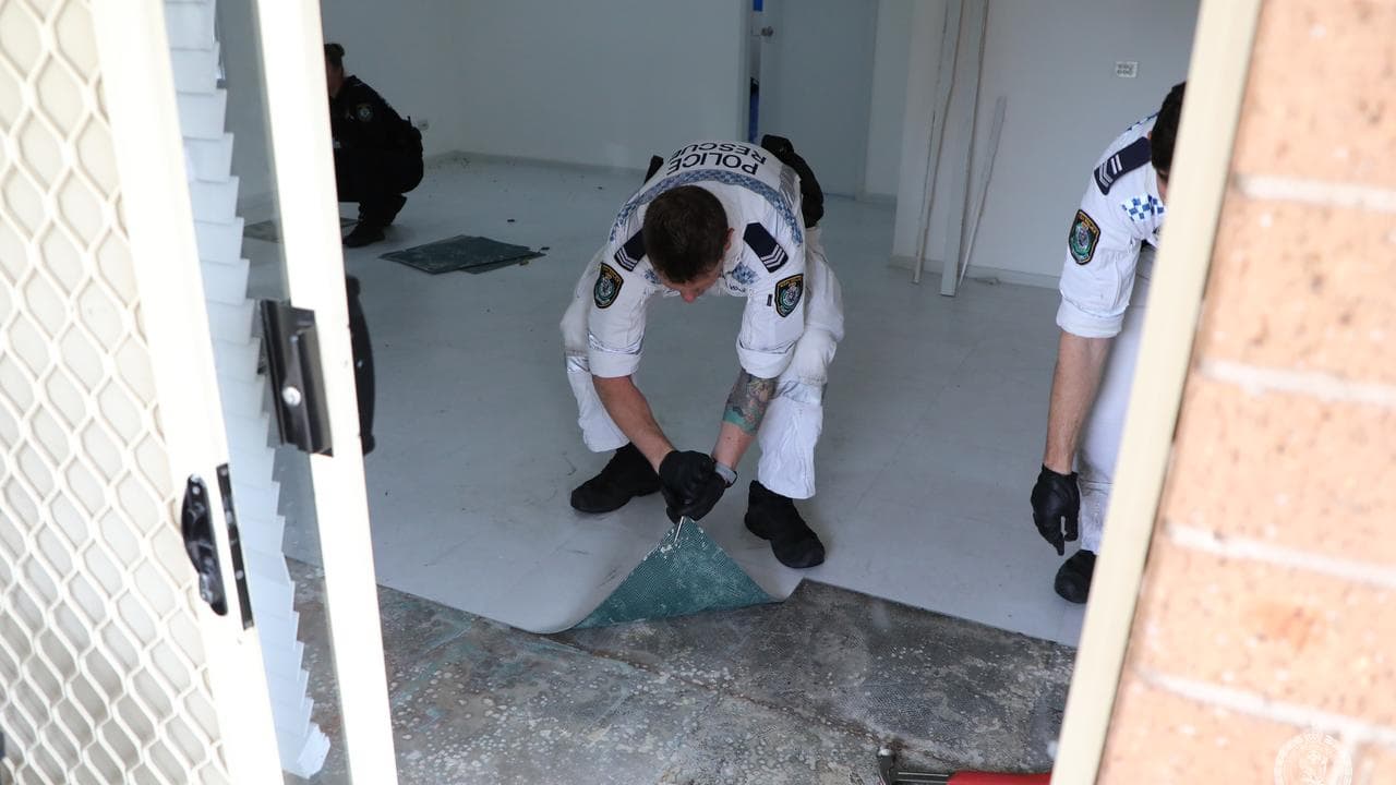 NSW police examining a home at Greenacre