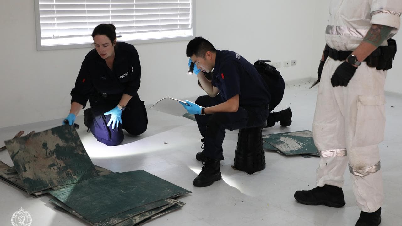 NSW police examining a home at Greenacre