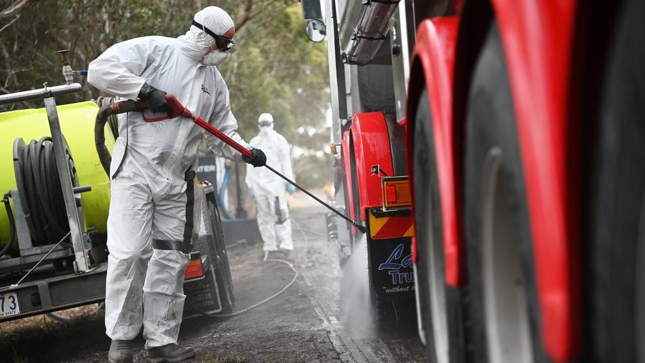 A truck is cleaned in a bird flu quarantine zone.