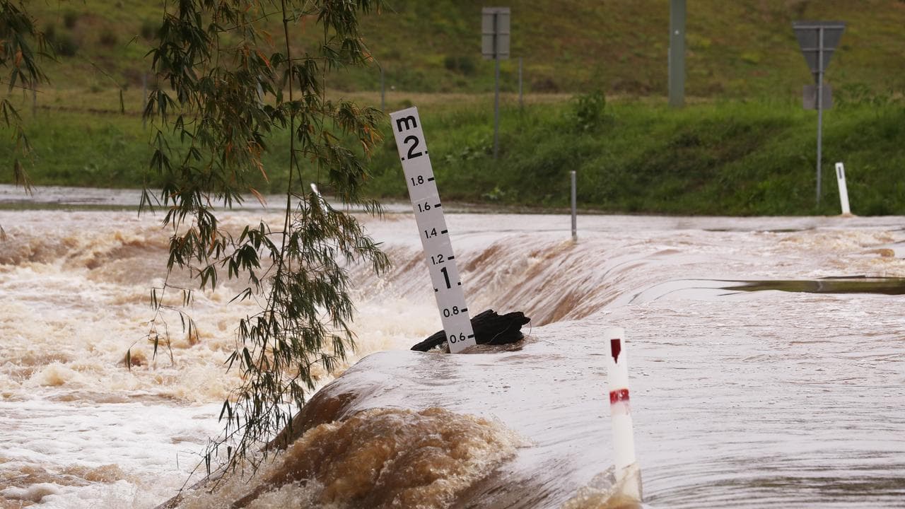 Water level gauge amid flooding in Maudsland on the Gold Coast