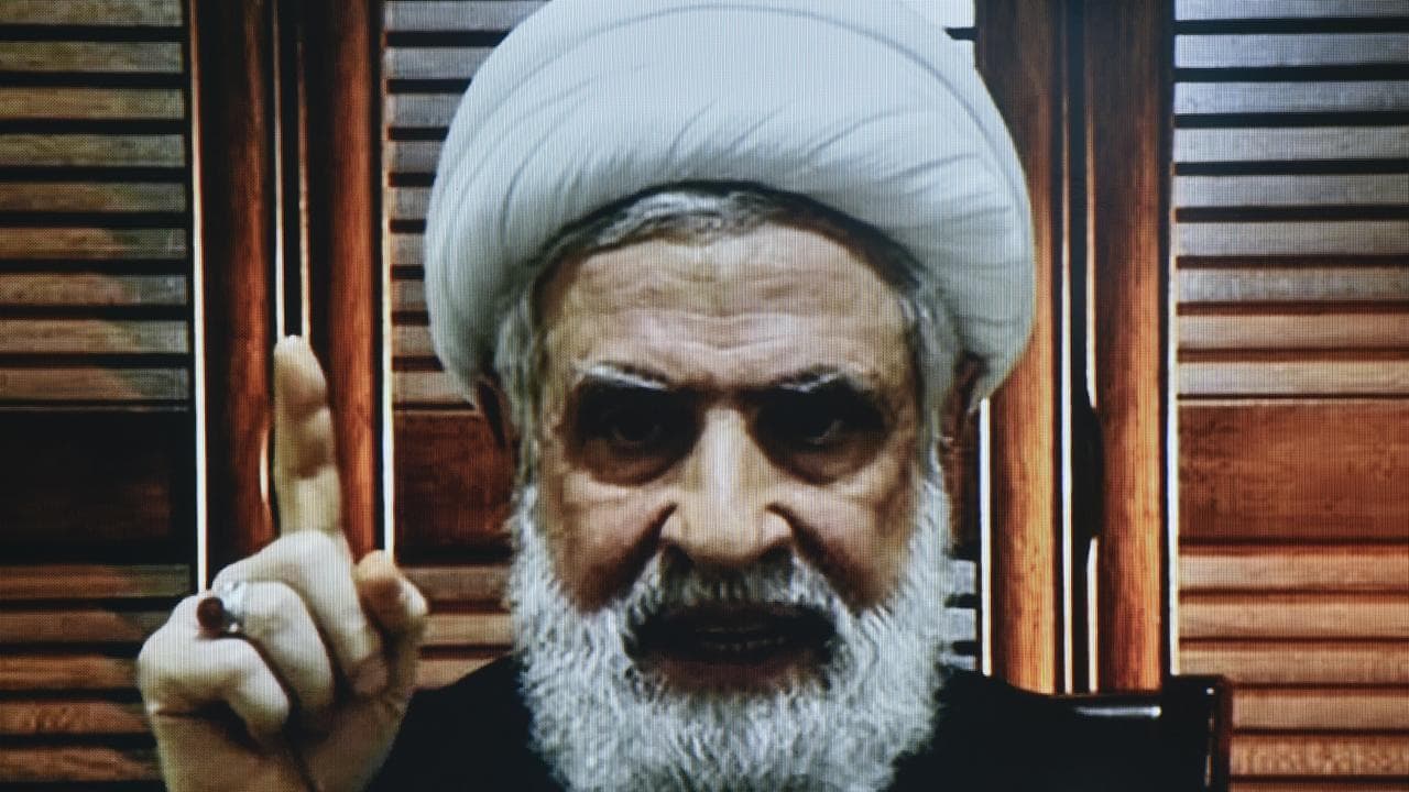 Hezbollah deputy leader Naim Qassem gives a televised address