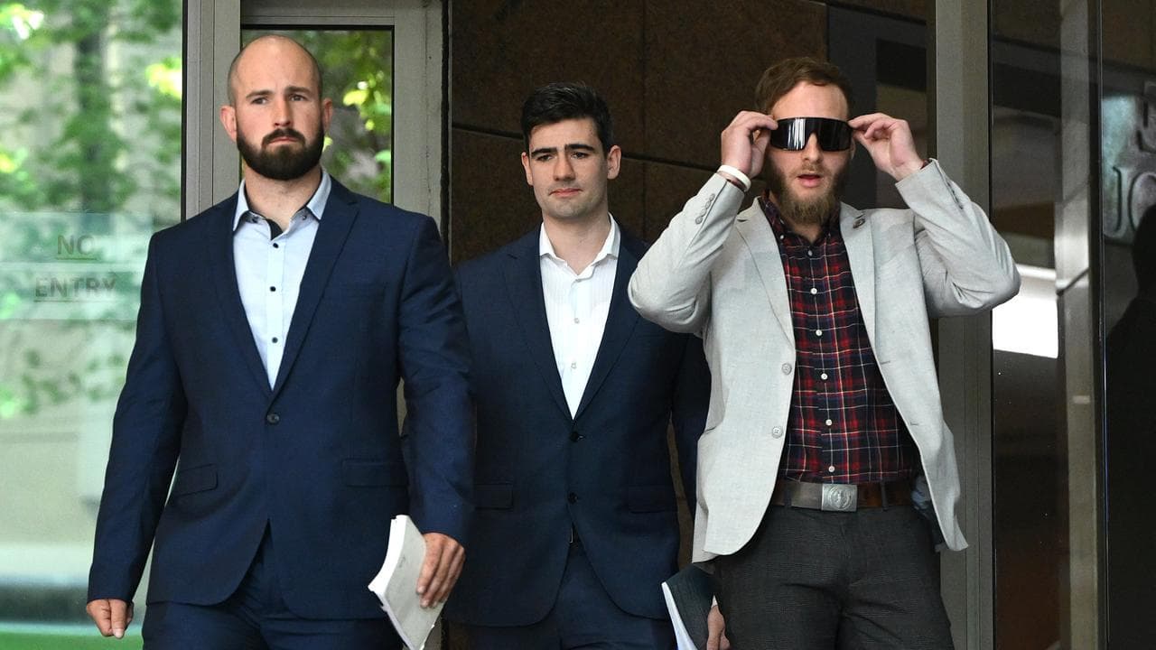 Jacob Hersant (centre) and Thomas Sewell (left) leave court