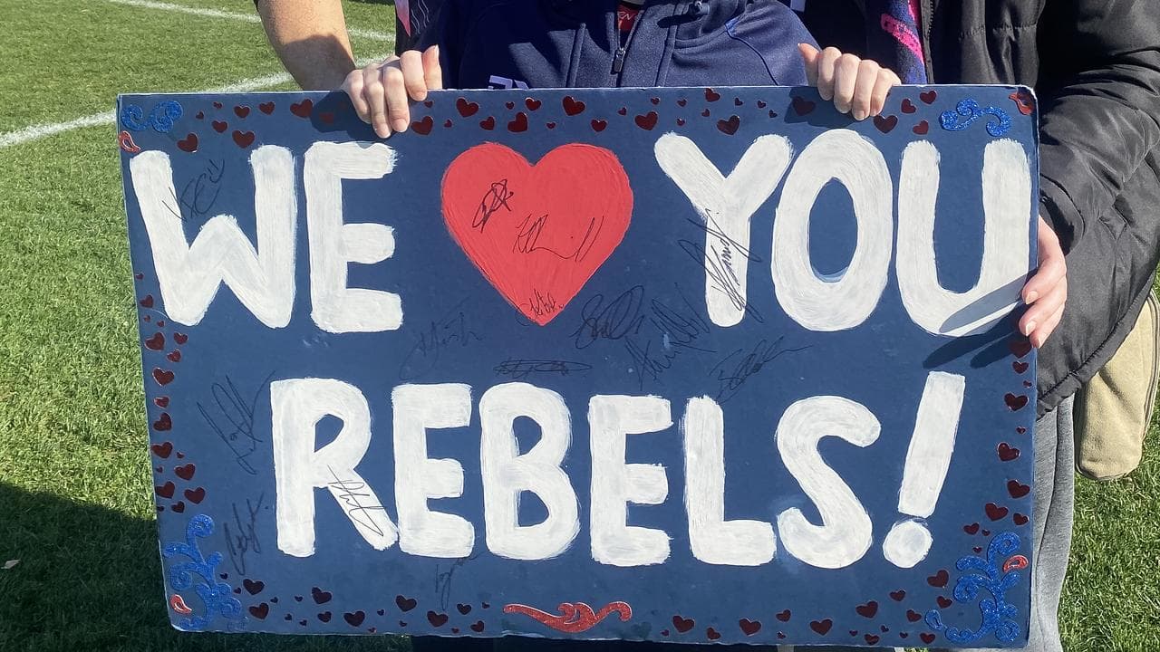 Rebels fans hold up sign (file image)