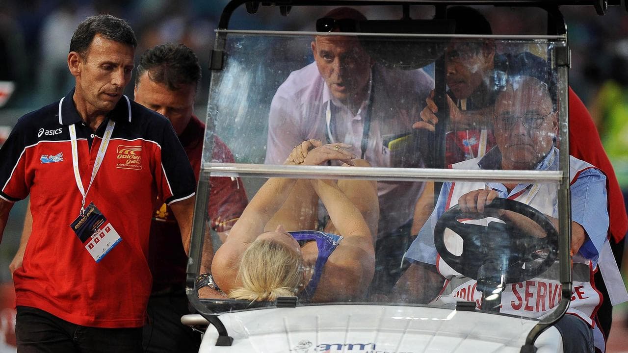 Sally Pearson gets medical help at the 2015 Golden Gala meet in Rome