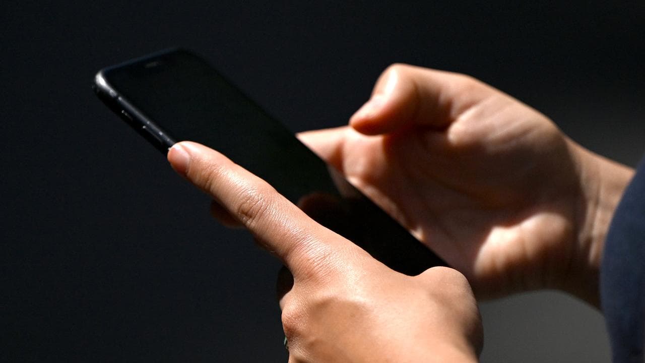 Person uses smartphone