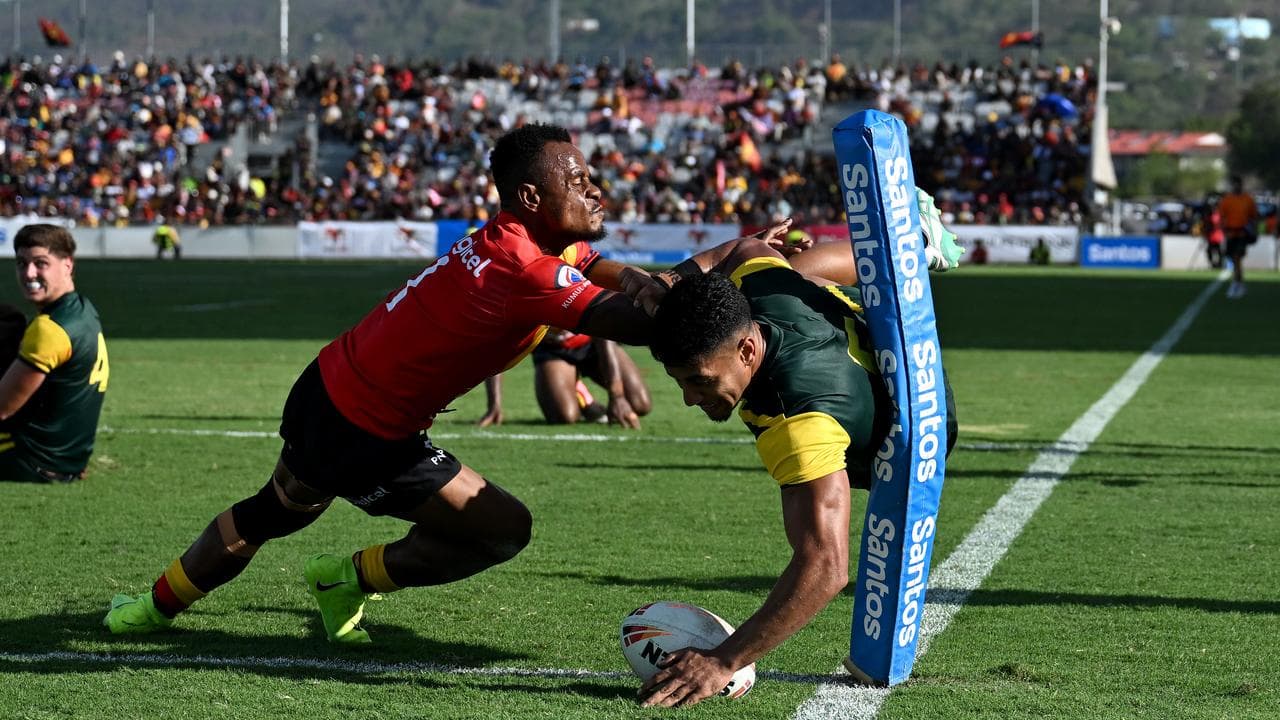 Alofiana Khan-Pereira scores in the corner.