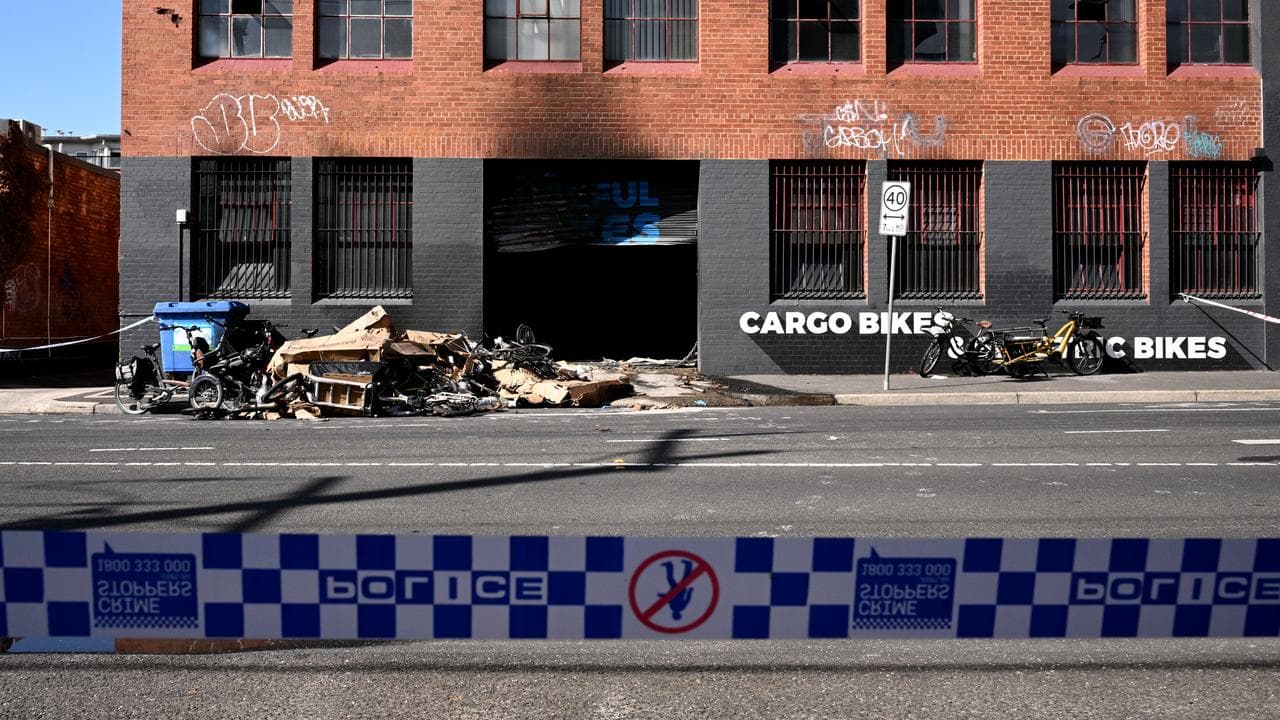 Police tape at the crime scene in front of the store