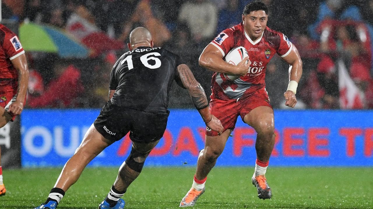 Jason Taumalolo (right).