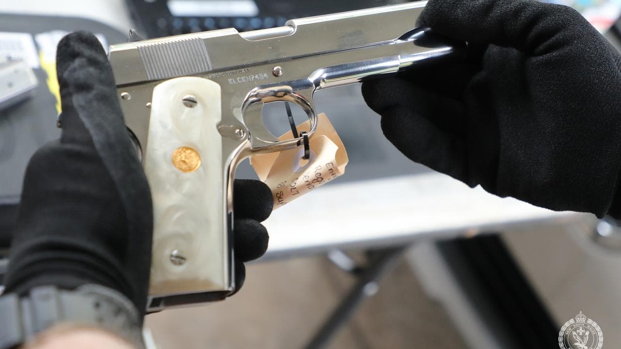 A gun seized during raids