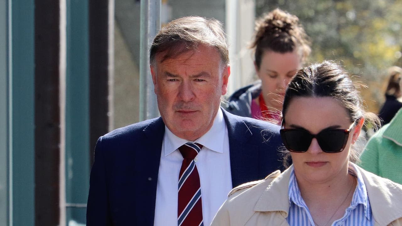 Supreme Court Justice Gregory Geason (left)