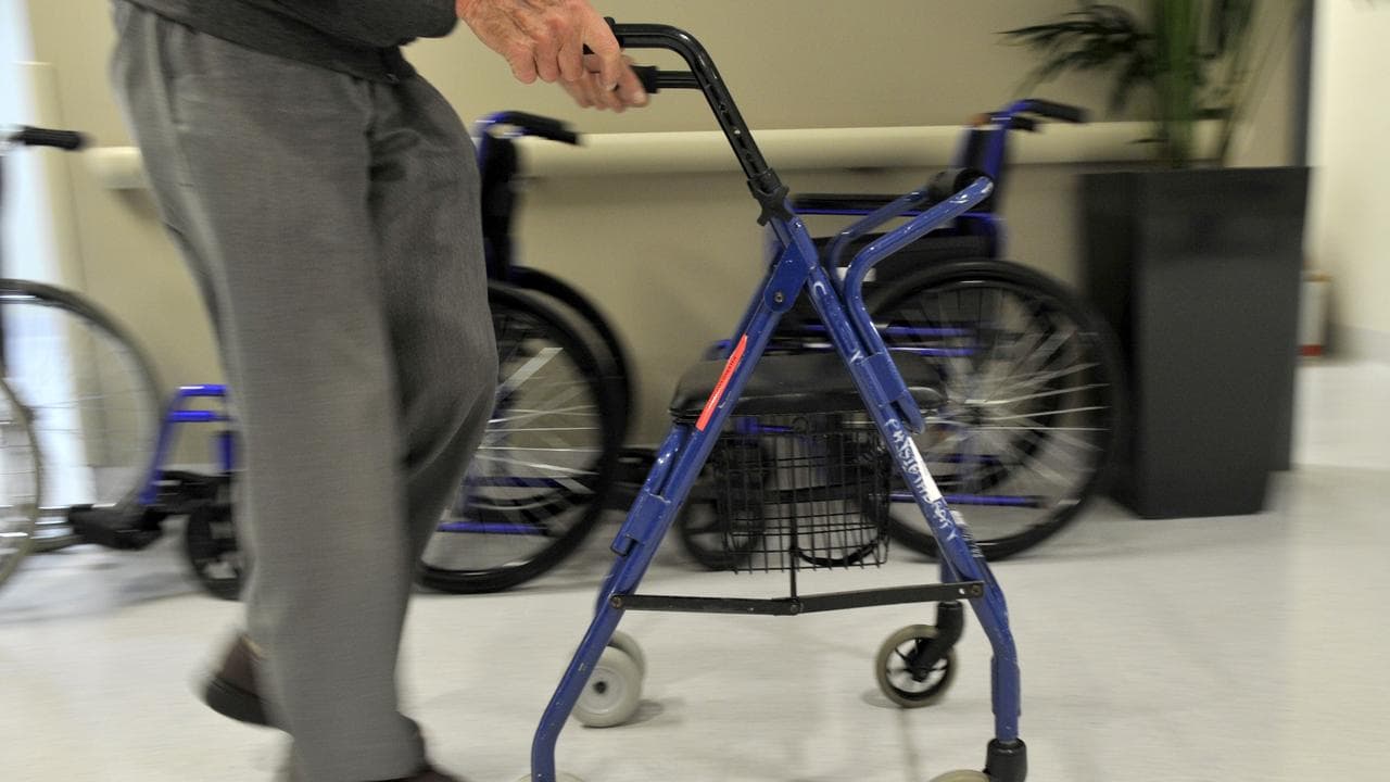 A person uses a walker (file image)