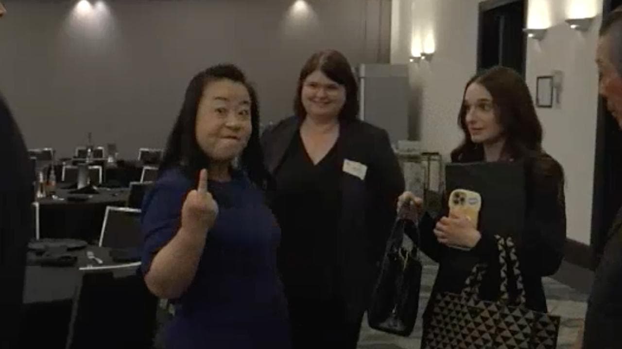 Grab of ACT Opposition Leader Elizabeth Lee making a rude gesture