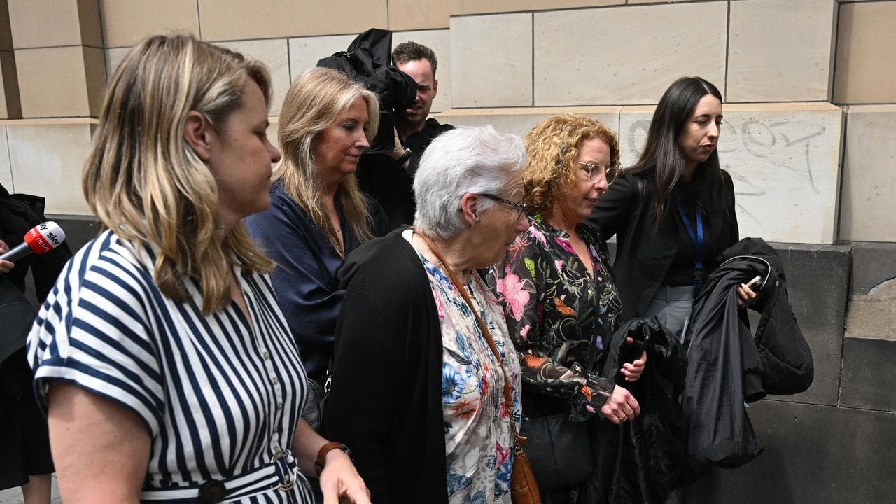 Robyn Hill (centre) and Deborah Hill (2nd right)